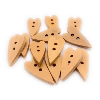 Heart-shaped wooden buttons with two holes.