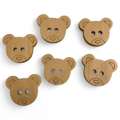 Six wooden bear-shaped buttons.