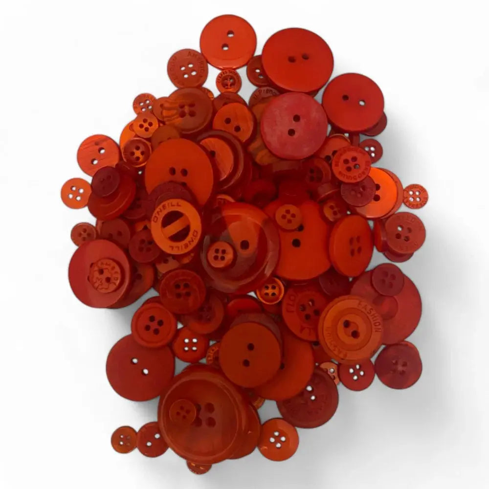Pile of red buttons.