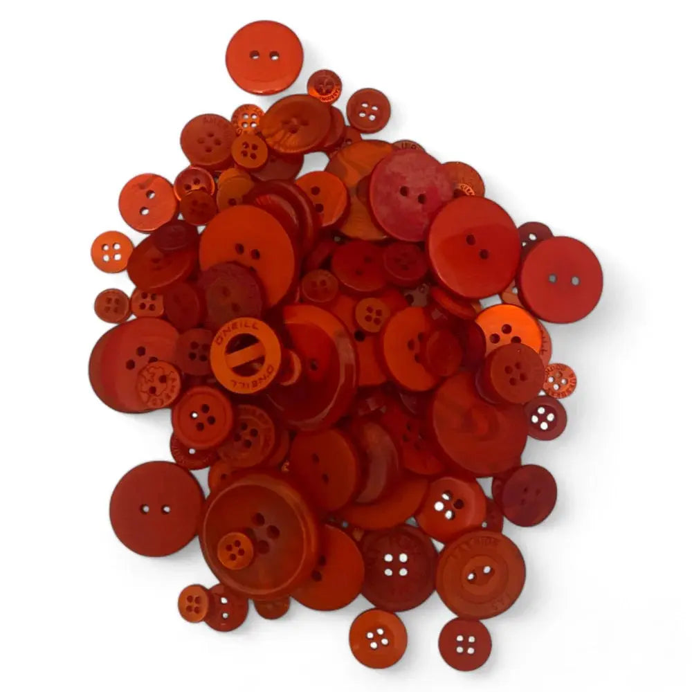 Pile of red buttons.