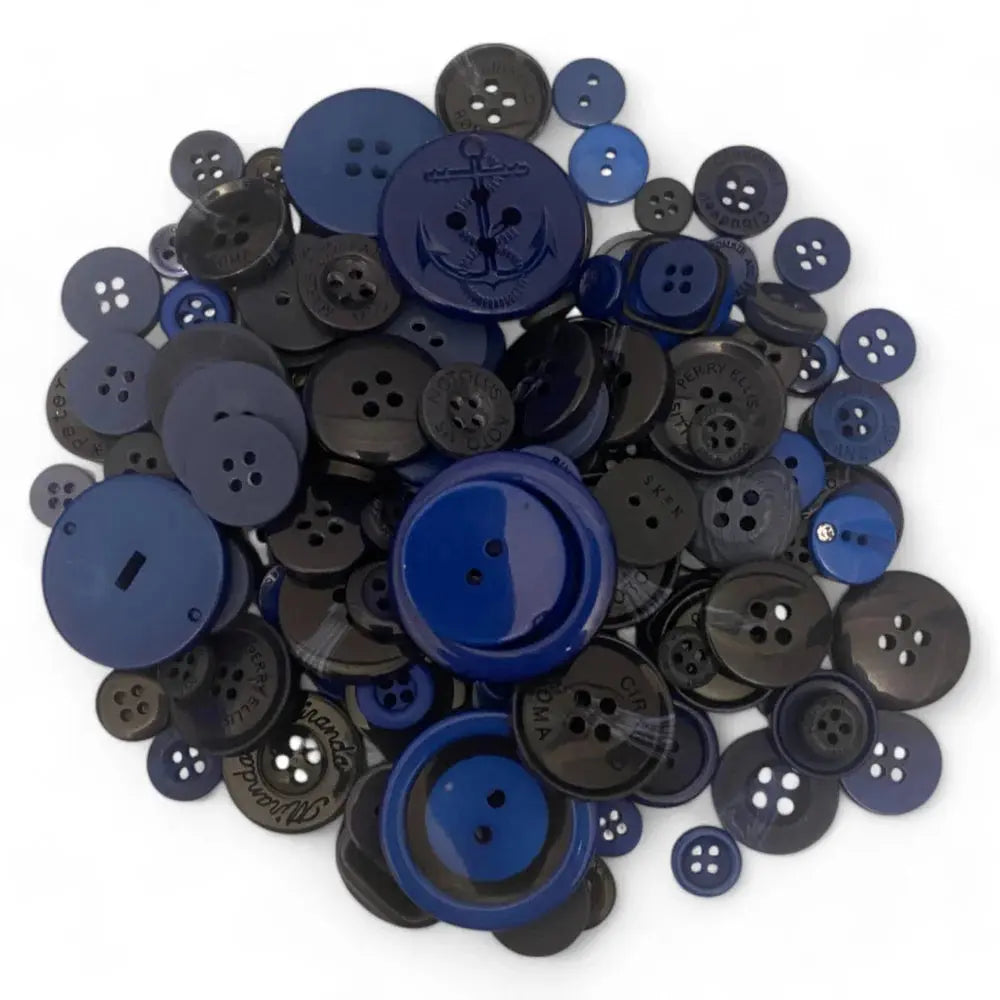 Pile of blue and black buttons.