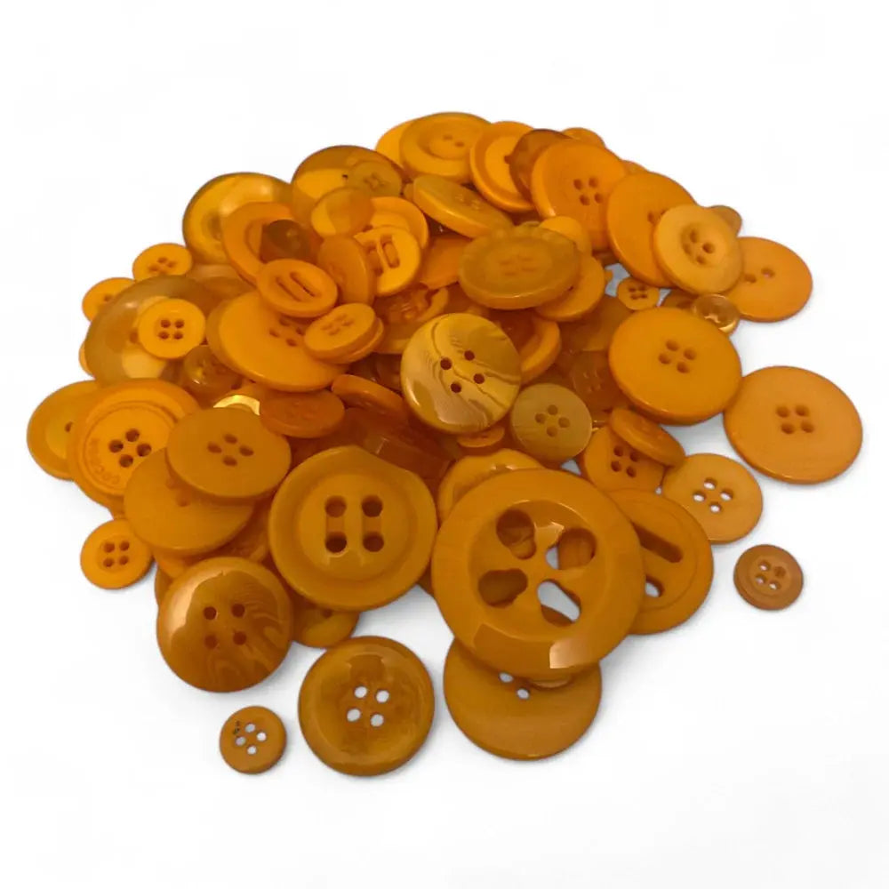 Pile of orange buttons.