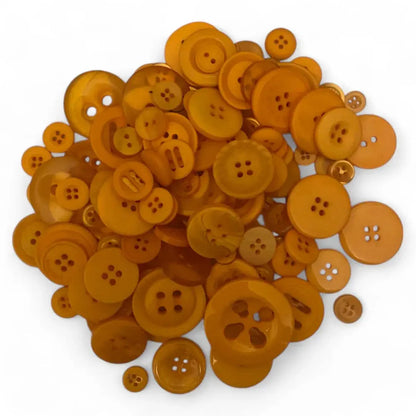 Pile of amber-colored buttons.