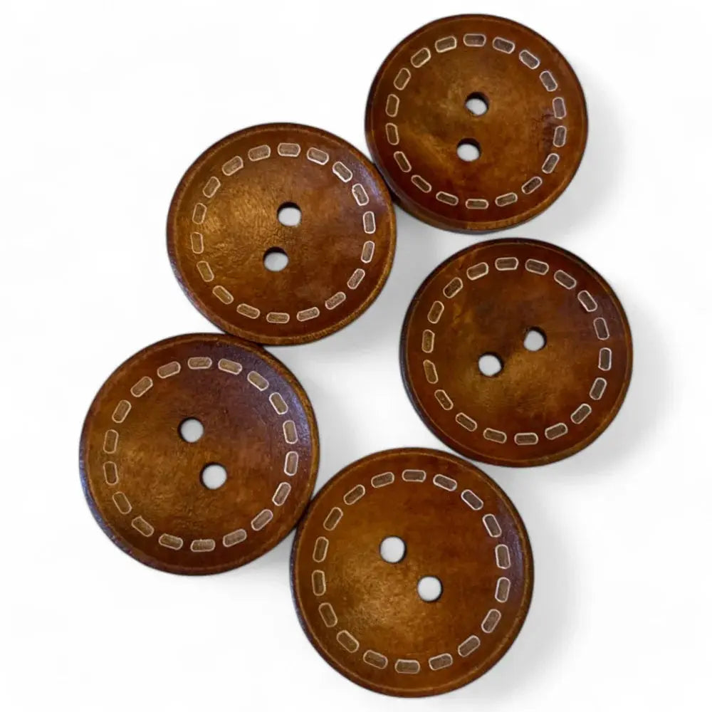 Five brown, round, two-hole buttons with decorative stitching.