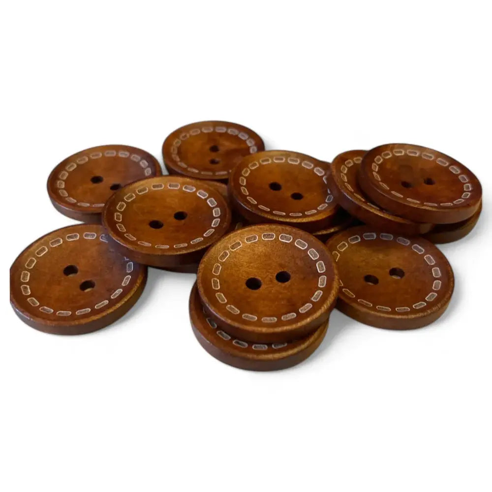 Pile of brown wooden buttons.