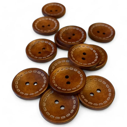 Brown wooden buttons with decorative stitching.