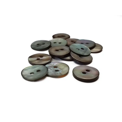Pile of iridescent two-hole buttons.