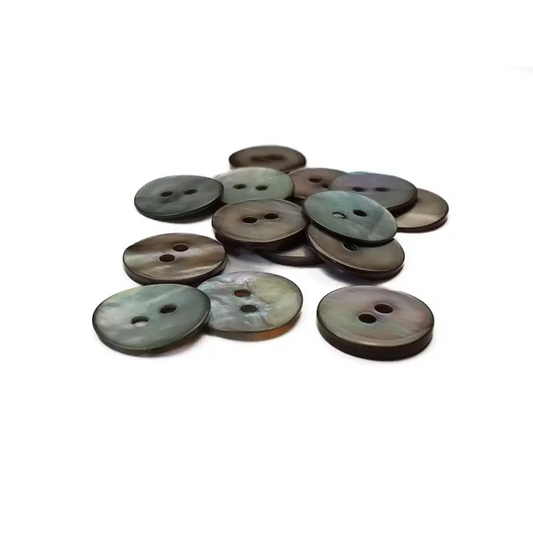 Pile of iridescent two-hole buttons.