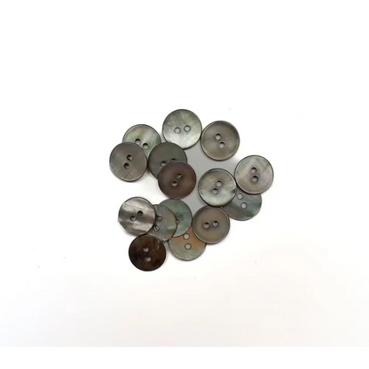 Pile of gray two-hole buttons.