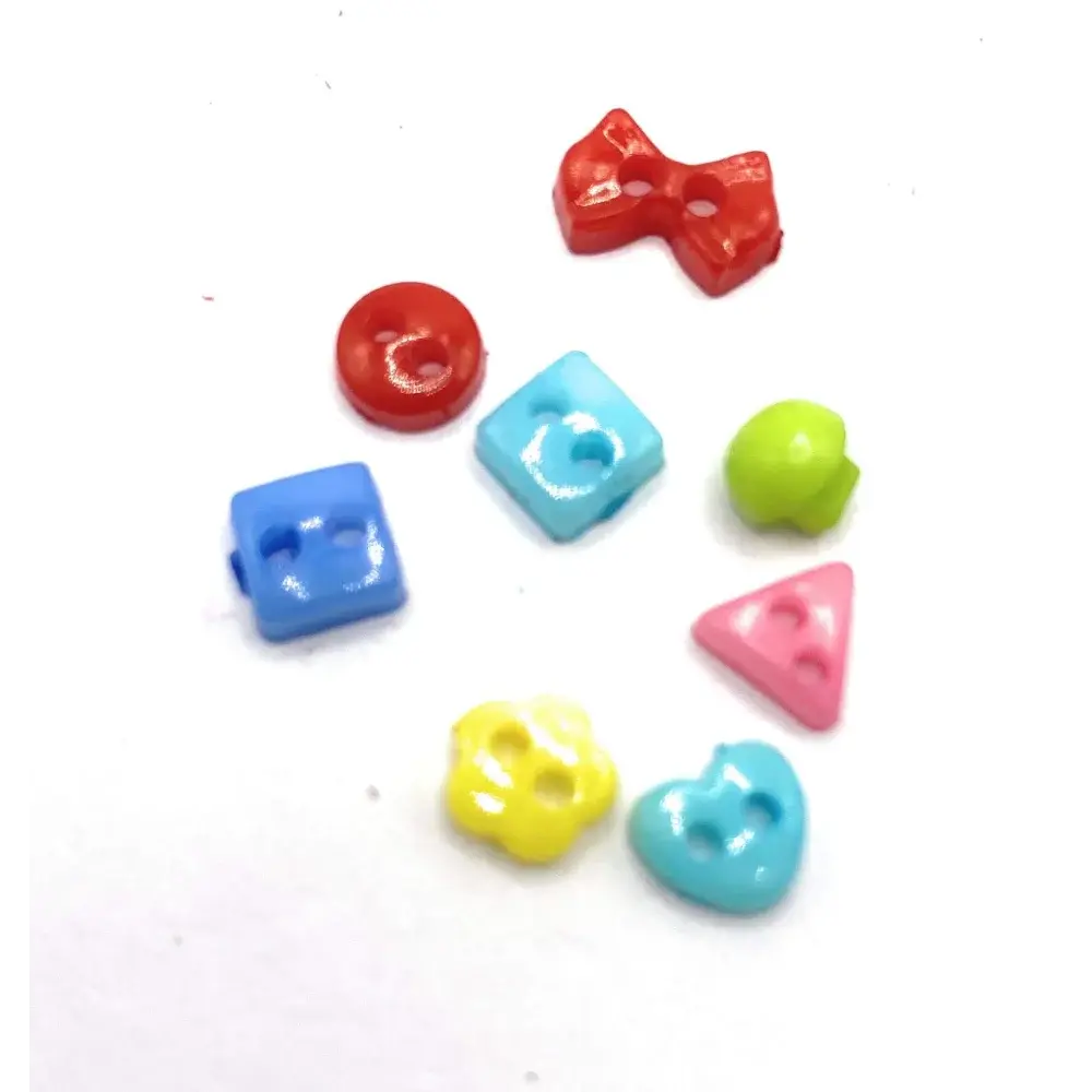 Colorful assortment of plastic buttons.