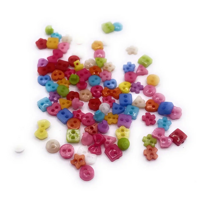 Colorful assortment of small, plastic buttons.
