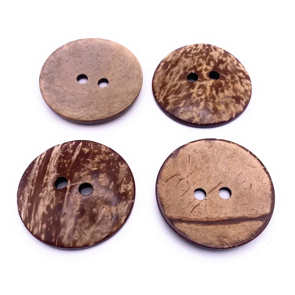 Four brown coconut buttons.