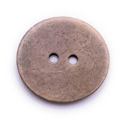 Two-hole, bronze-colored button.