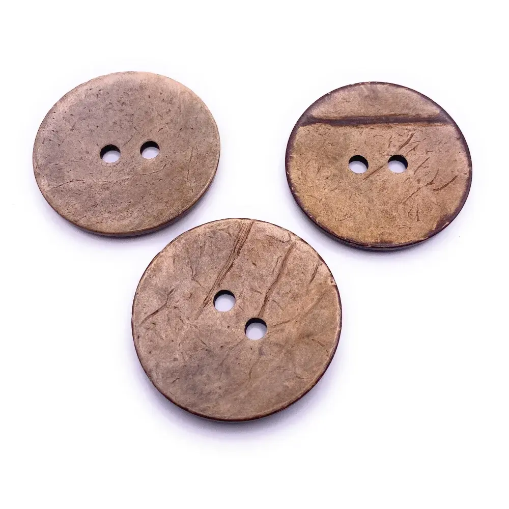 Three brown, two-hole buttons.