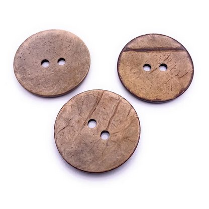Three brown, two-hole buttons.
