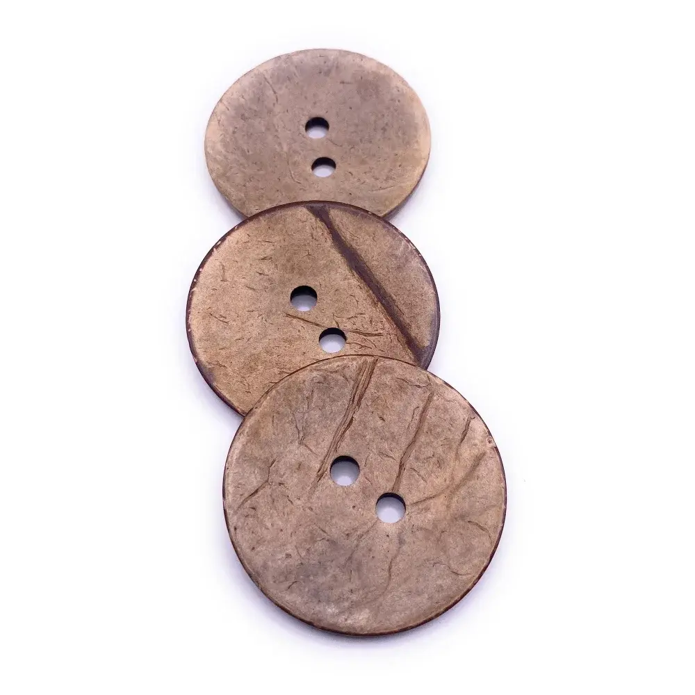 Stacked brown coconut buttons.