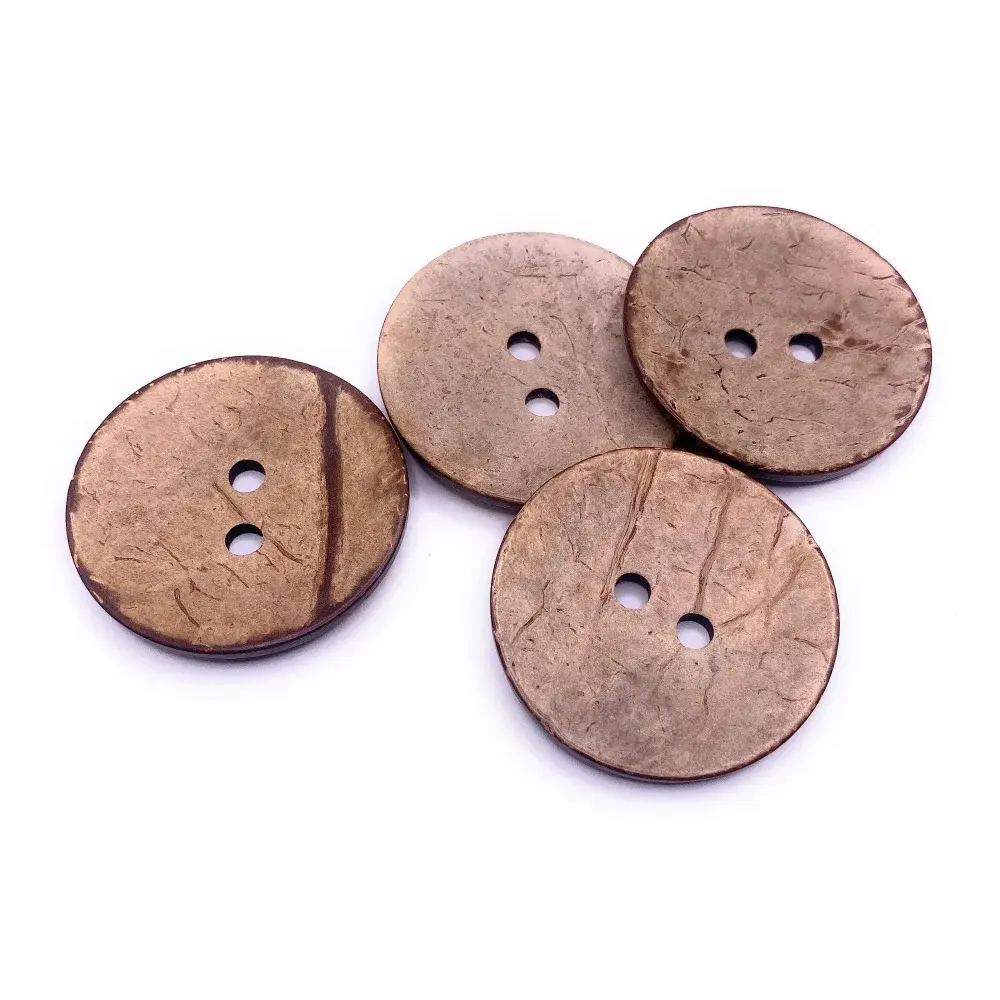 Four brown coconut buttons.
