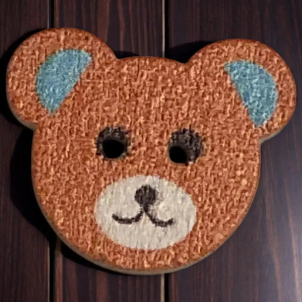Textured brown teddy bear face.