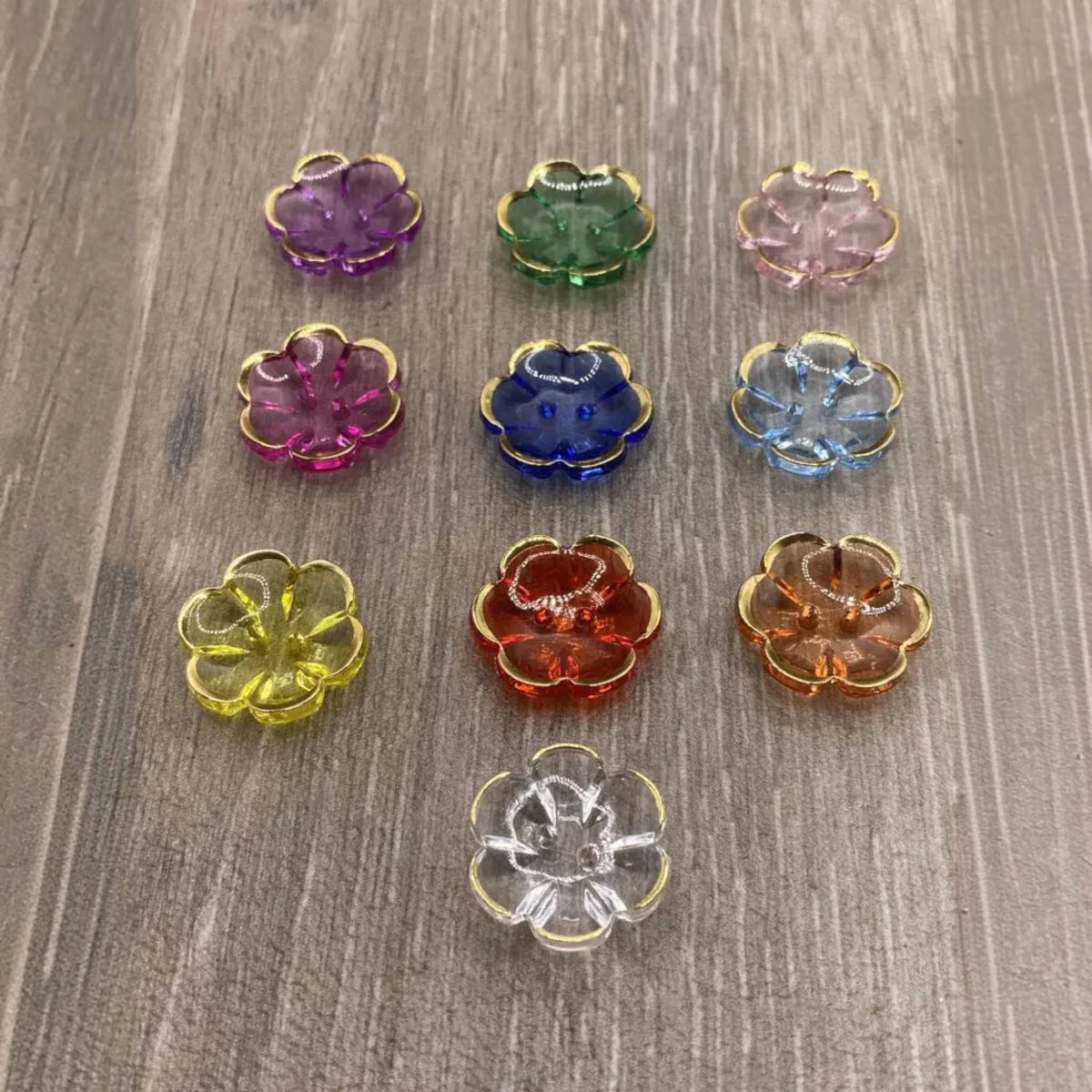 Colorful flower-shaped glass beads.