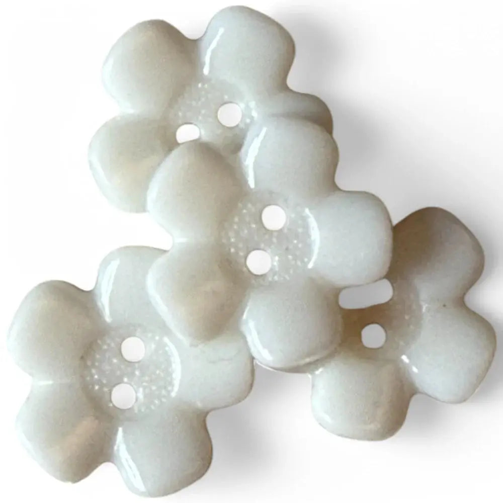 White flower-shaped buttons.