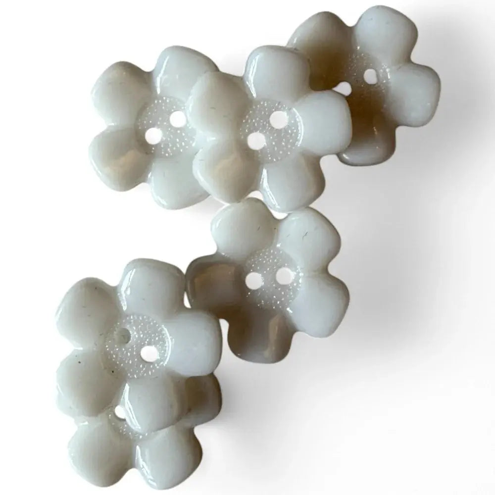 White flower-shaped buttons.