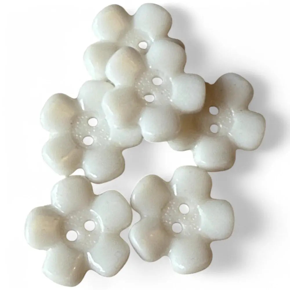 White flower-shaped buttons.