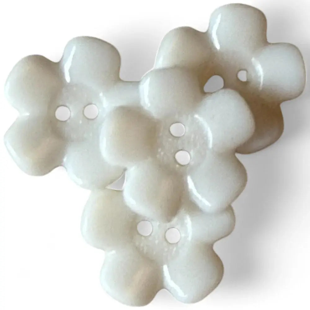 Four-holed flower-shaped buttons.