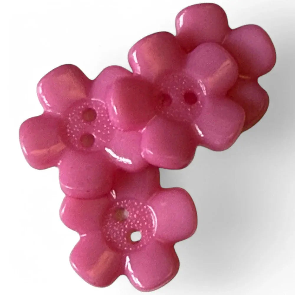 Pink flower-shaped buttons.