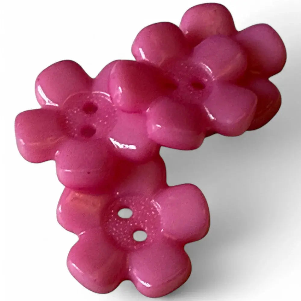 Pink flower-shaped buttons.