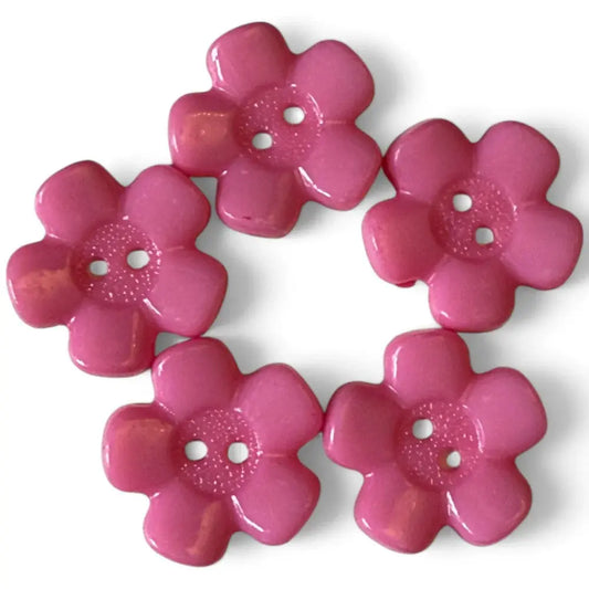 Five pink flower-shaped buttons.