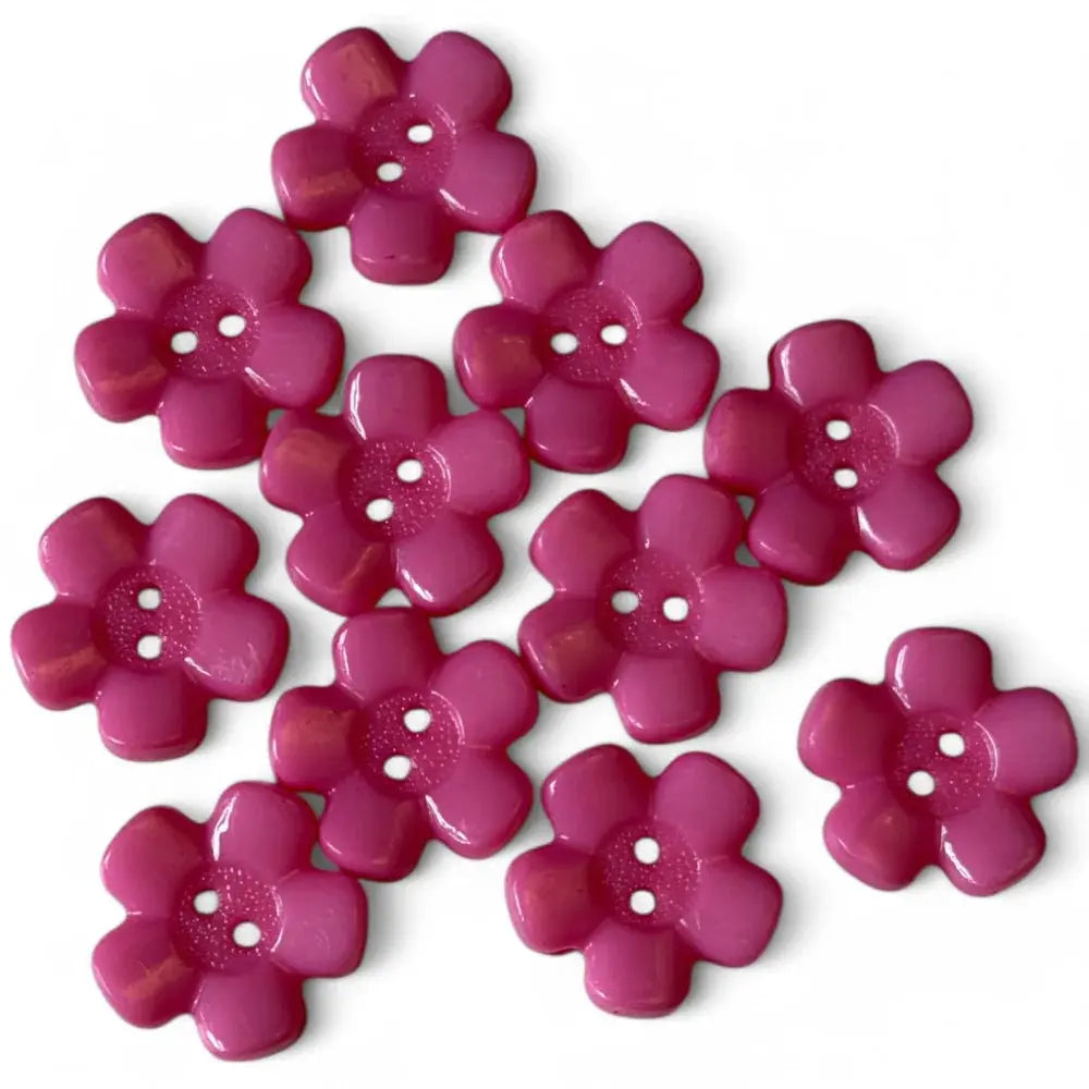Magenta flower-shaped buttons.