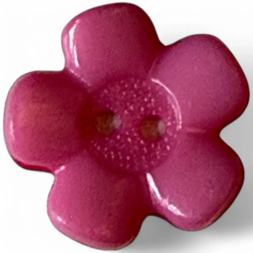 Pink flower-shaped button.