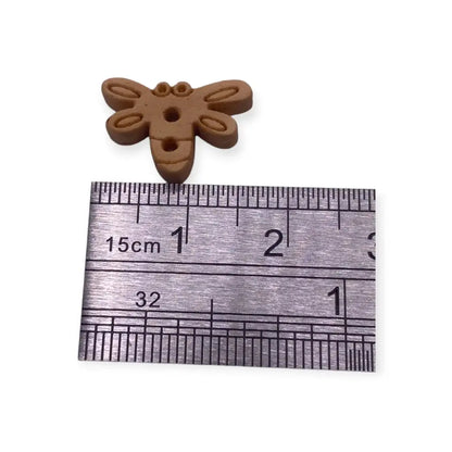 Brown bee-shaped button.