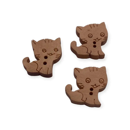 Three brown cat-shaped buttons.