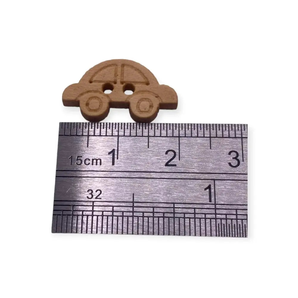 Brown car-shaped button.