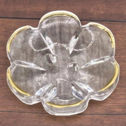 KnitForLess 13mm baby blue flower-shaped clear acrylic button with a gold rim and two-hole design for sewing.