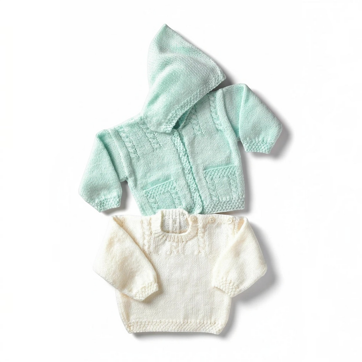 KnitForLess UKHKA knitting pattern for a mint green hooded cardigan and a white sweater with cable detailing.