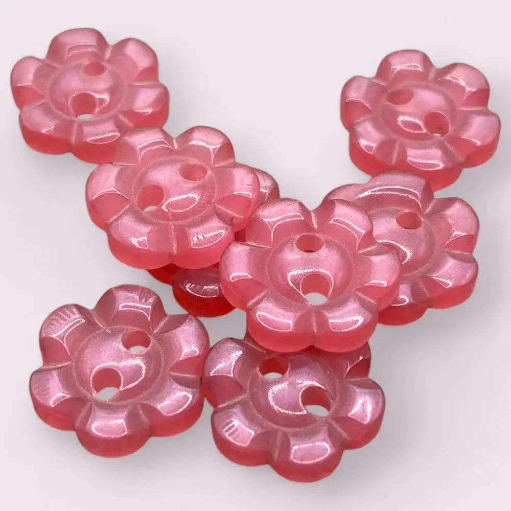 Pink flower-shaped buttons.