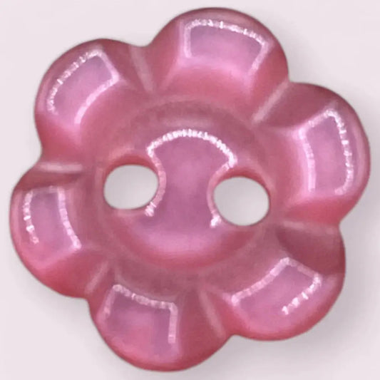Pink flower-shaped button.