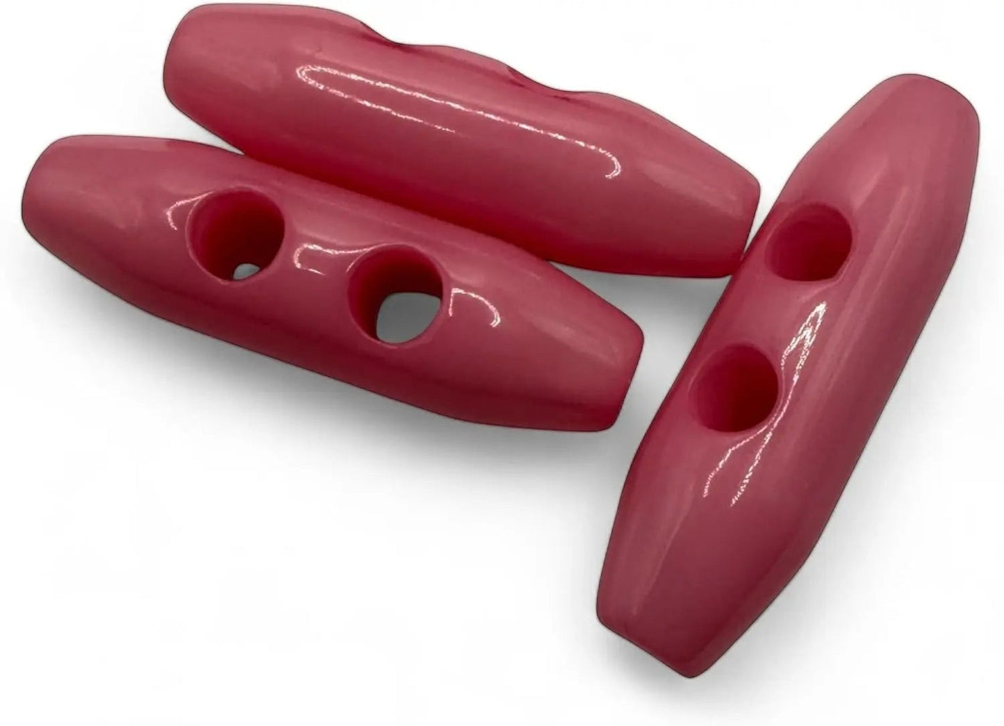 KnitForLess baby pink 38mm plastic toggle buttons with a 2-hole design for coats and jackets