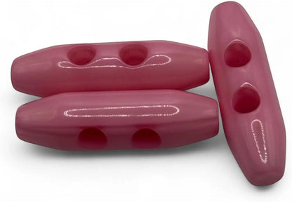 KnitForLess baby pink 38mm plastic toggle buttons with a 2-hole design for sewing coats and jackets
