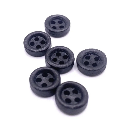 Six black, round, four-hole buttons.