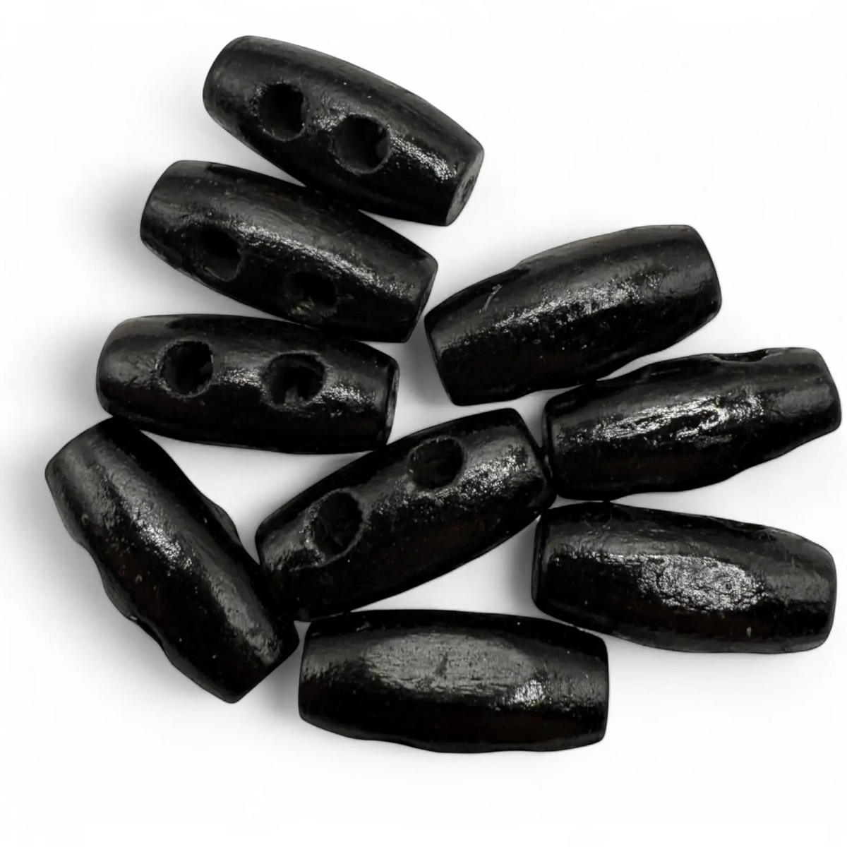 KnitForLess black wooden mini barrel toggle buttons for baby cardigans and craft sewing projects