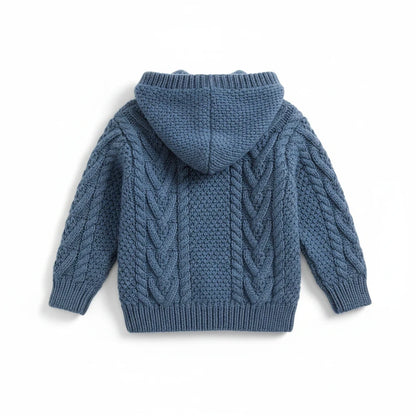 KnitForLess blue children's aran hooded jacket with textured cable knit pattern, back view on white background.