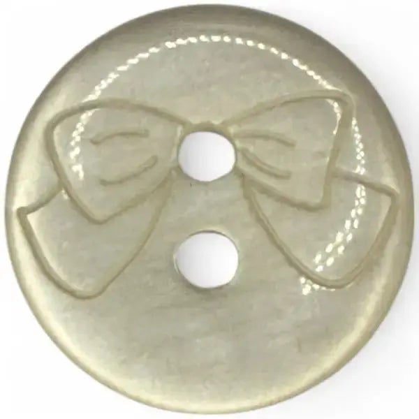 Round, translucent button with a bow design.