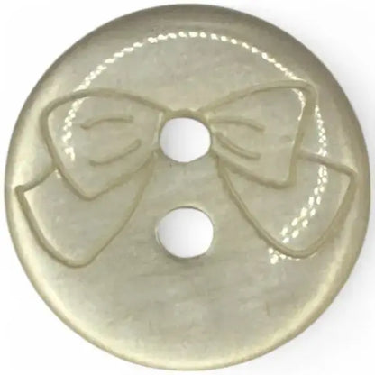 Round, translucent button with a bow design.