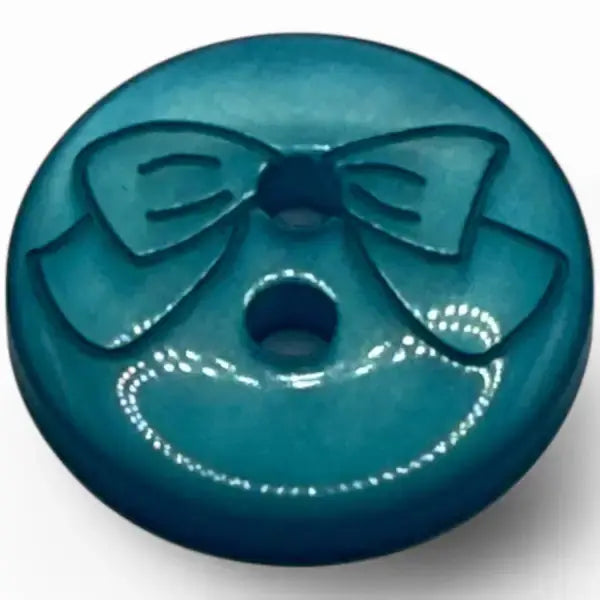 Teal button with a bow.