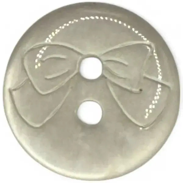 Gray button with bow design.