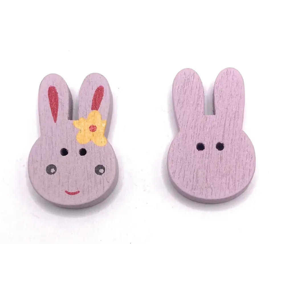 Two wooden bunny buttons.