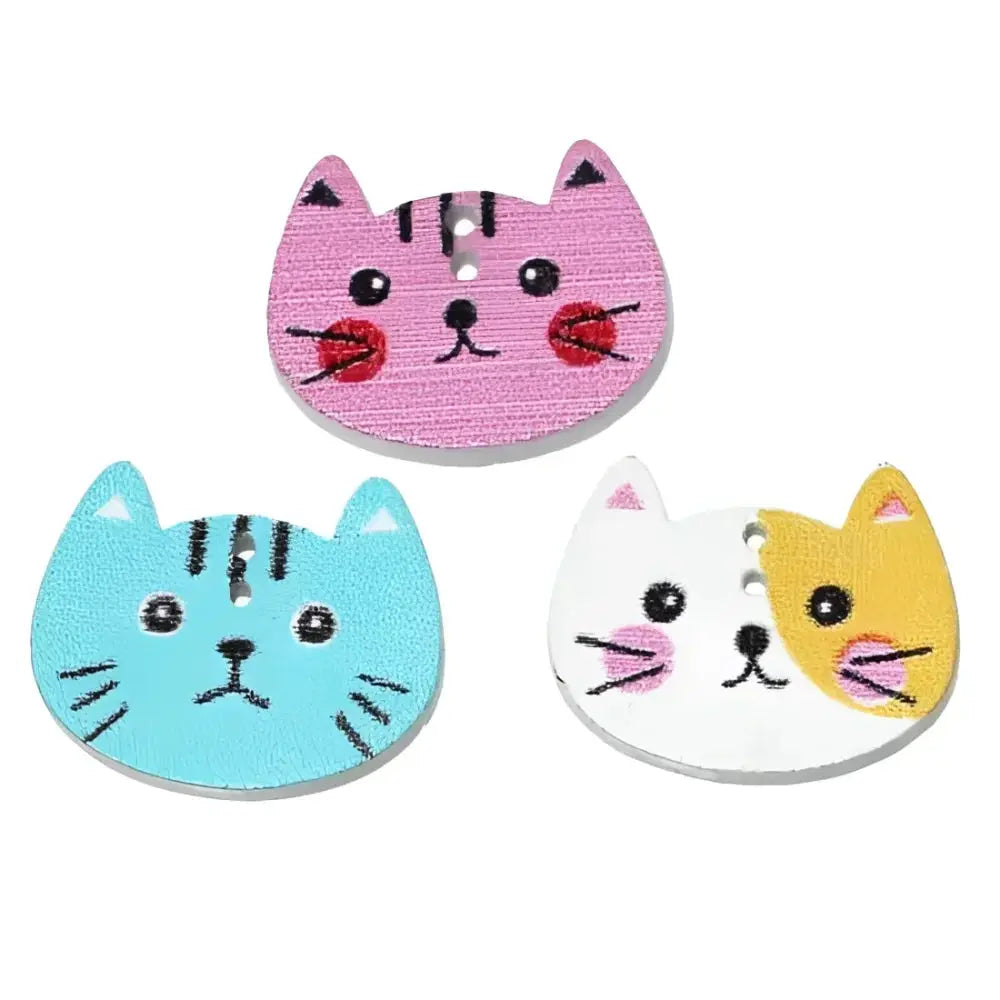 Three cat-shaped wooden buttons.